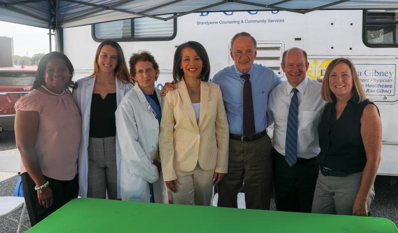 Gathered Sept. 5 to celebrate the federal funding announcement are (l-r) Rep. Sherry Dorsey Walker, D-Wilmington; Amanda Mahler, PA, Gibney Mobile Healthcare assistant medical director; Dr. Sandra Gibney, Gibney Mobile Healthcare founder; U.S. Rep. Lisa Blunt Rochester; U.S. Sen. Tom Carper; U.S. Sen. Chris Coons; and Dr. Lynn Fahey Morrison, Brandywine Counseling & Community Services Inc. CEO. SUBMITTED PHOTO